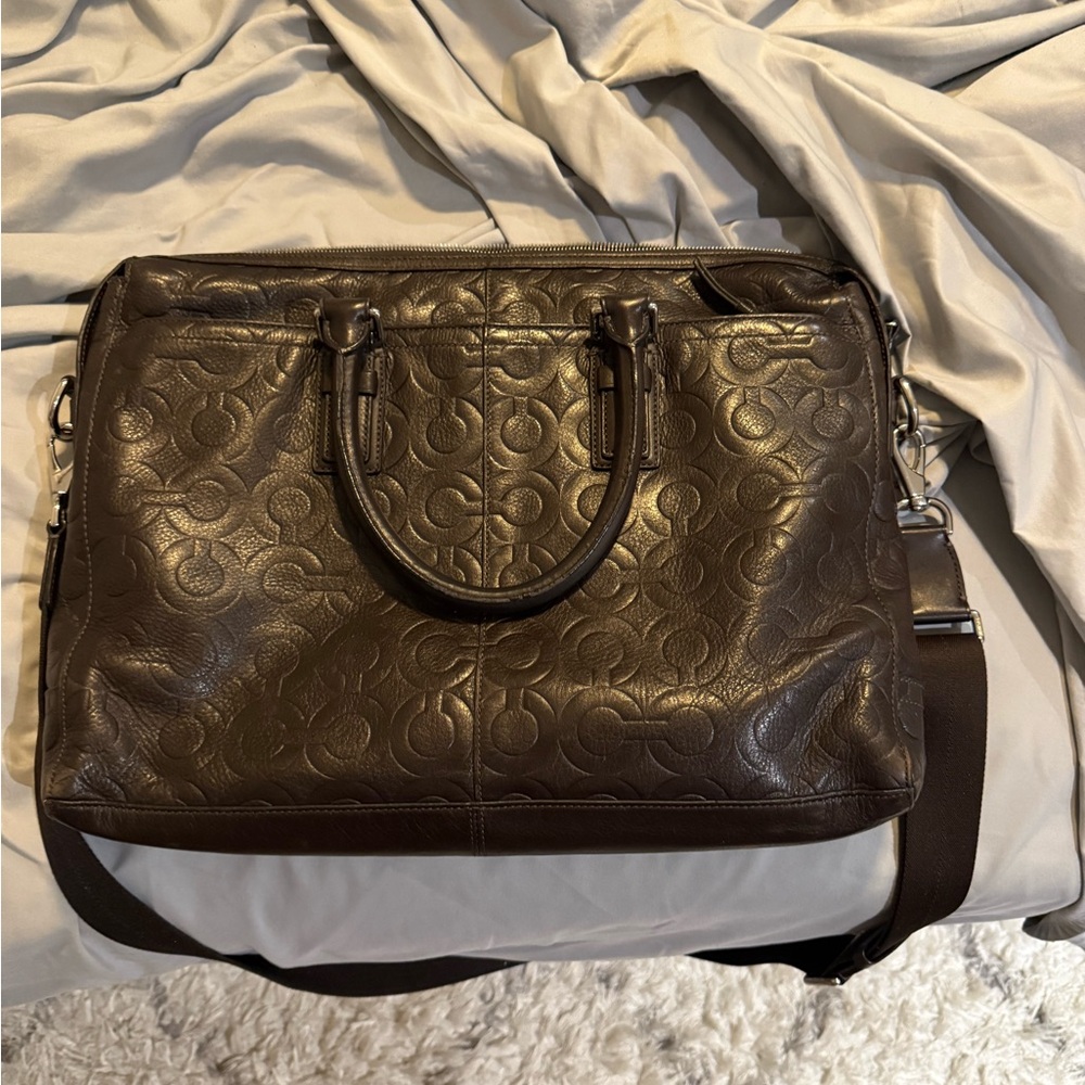 Like new Men’s Coach leather messenger bag used twice